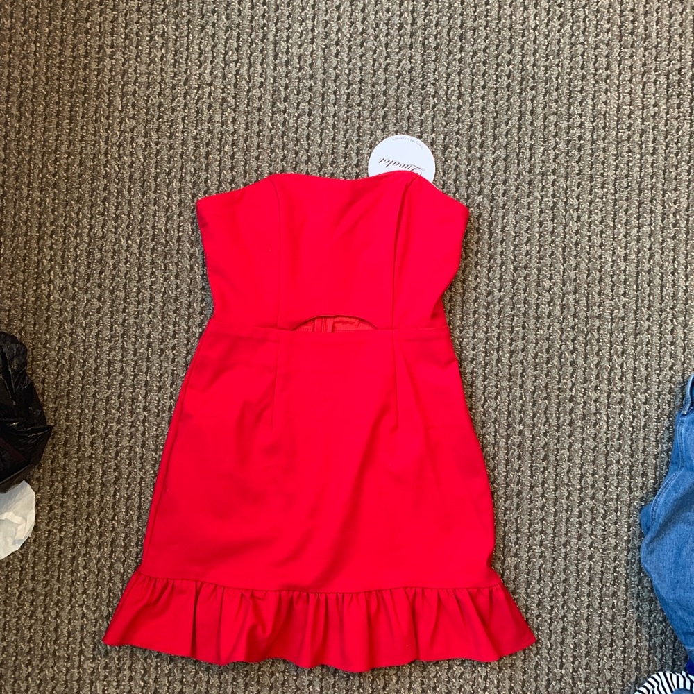 Red dress with ruffle at the bottom